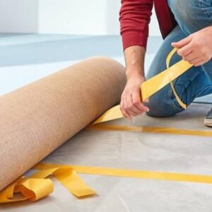 carpet laying tape in action